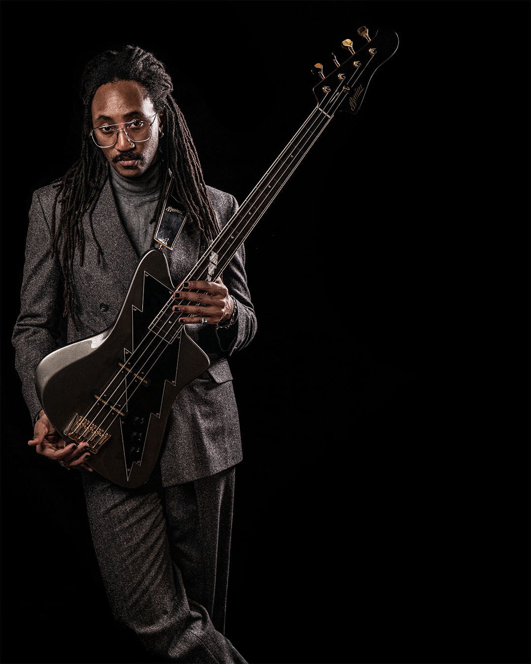 Seye Adelekan from Gorillaz with his signature Thunder Bass guitar
