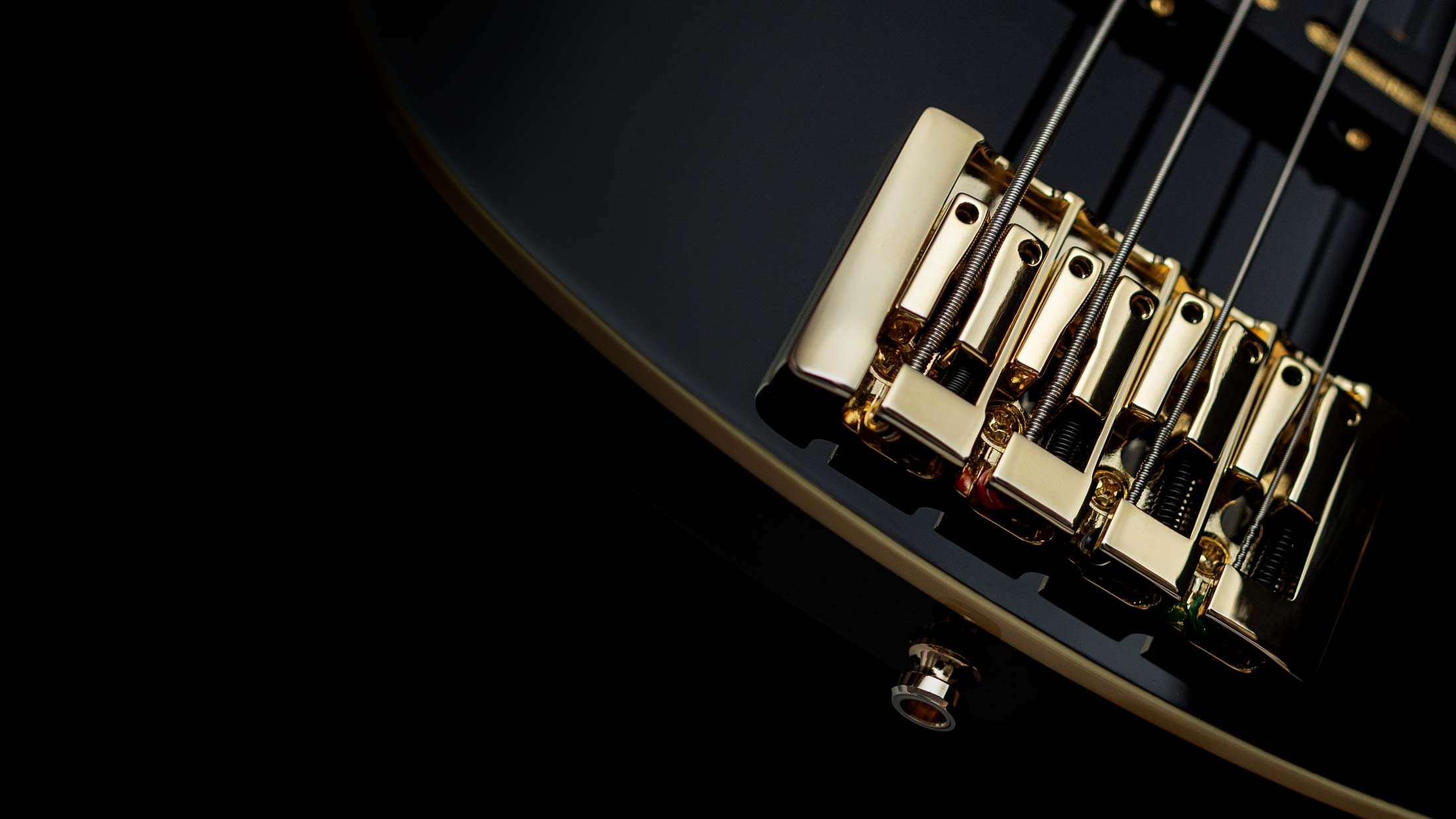 Baum Bass bridge in gold for top-loaded strings